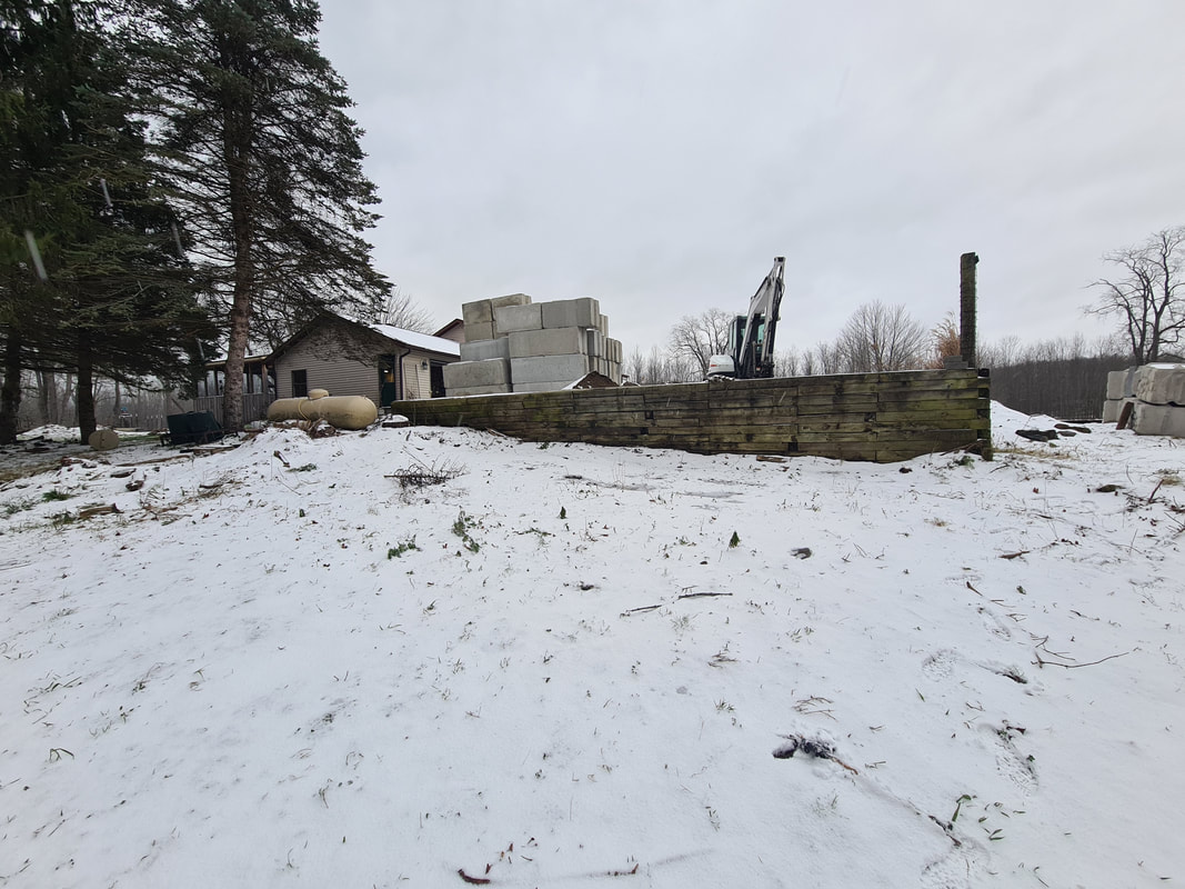 Winter landscaping project site in Fulton, NY