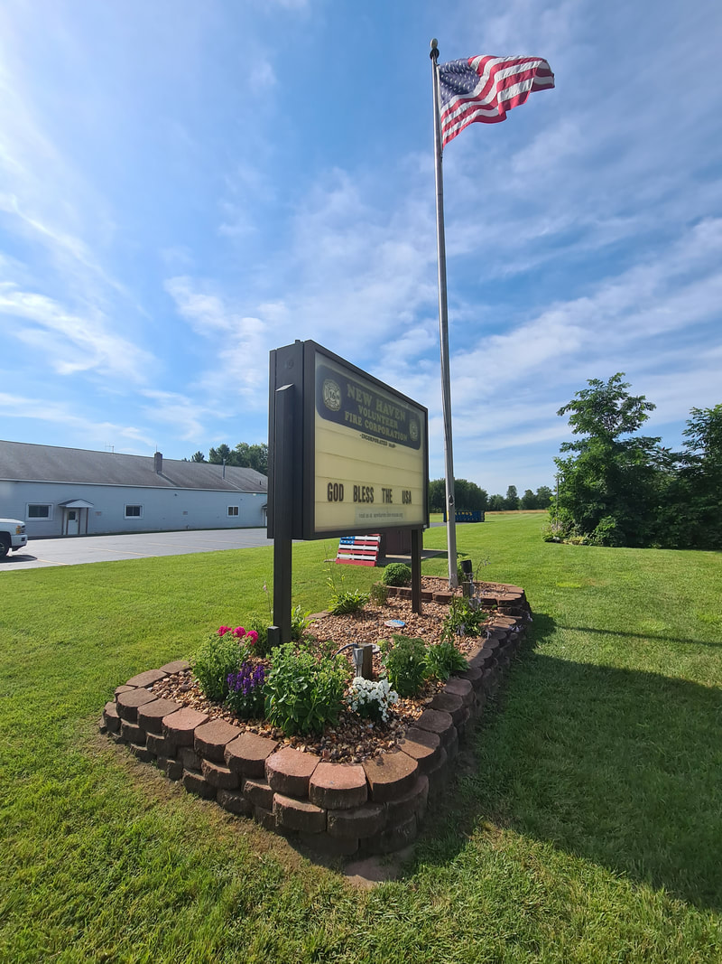 Stone flowerbed at New Haven fire department, Oswego County