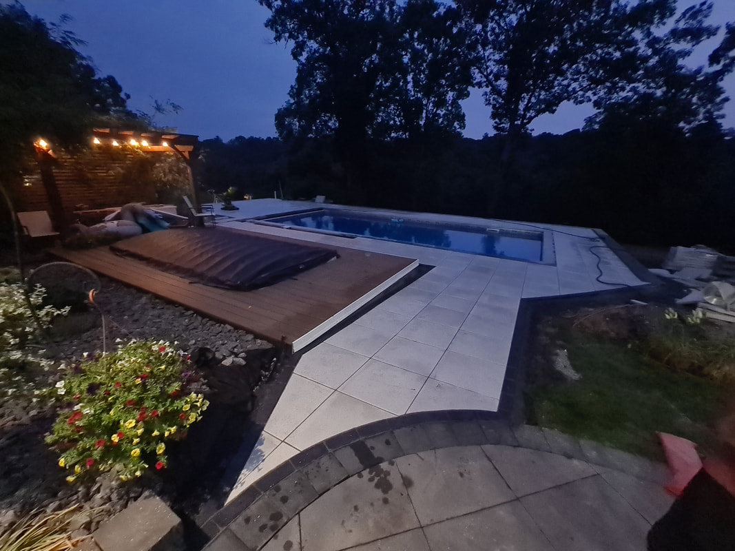 Paver patio and pool surround in Oswego, NY